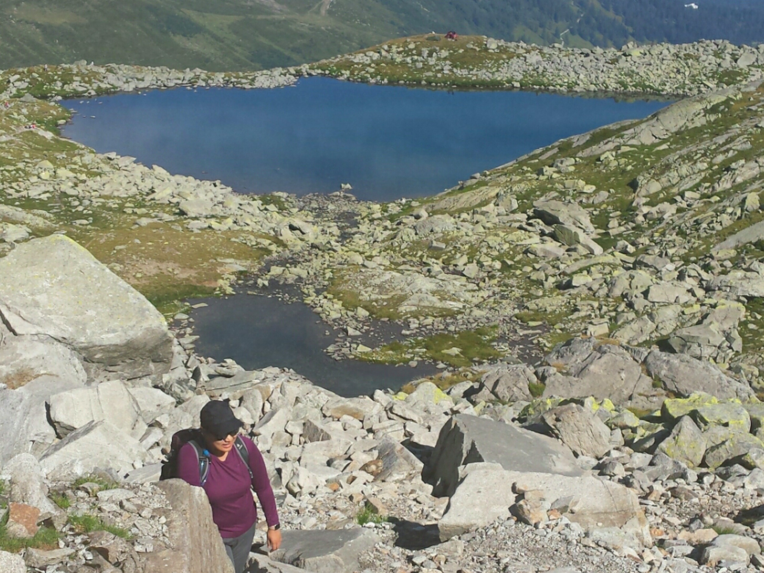 Hikers ascending the trail near Pizzo della Casa