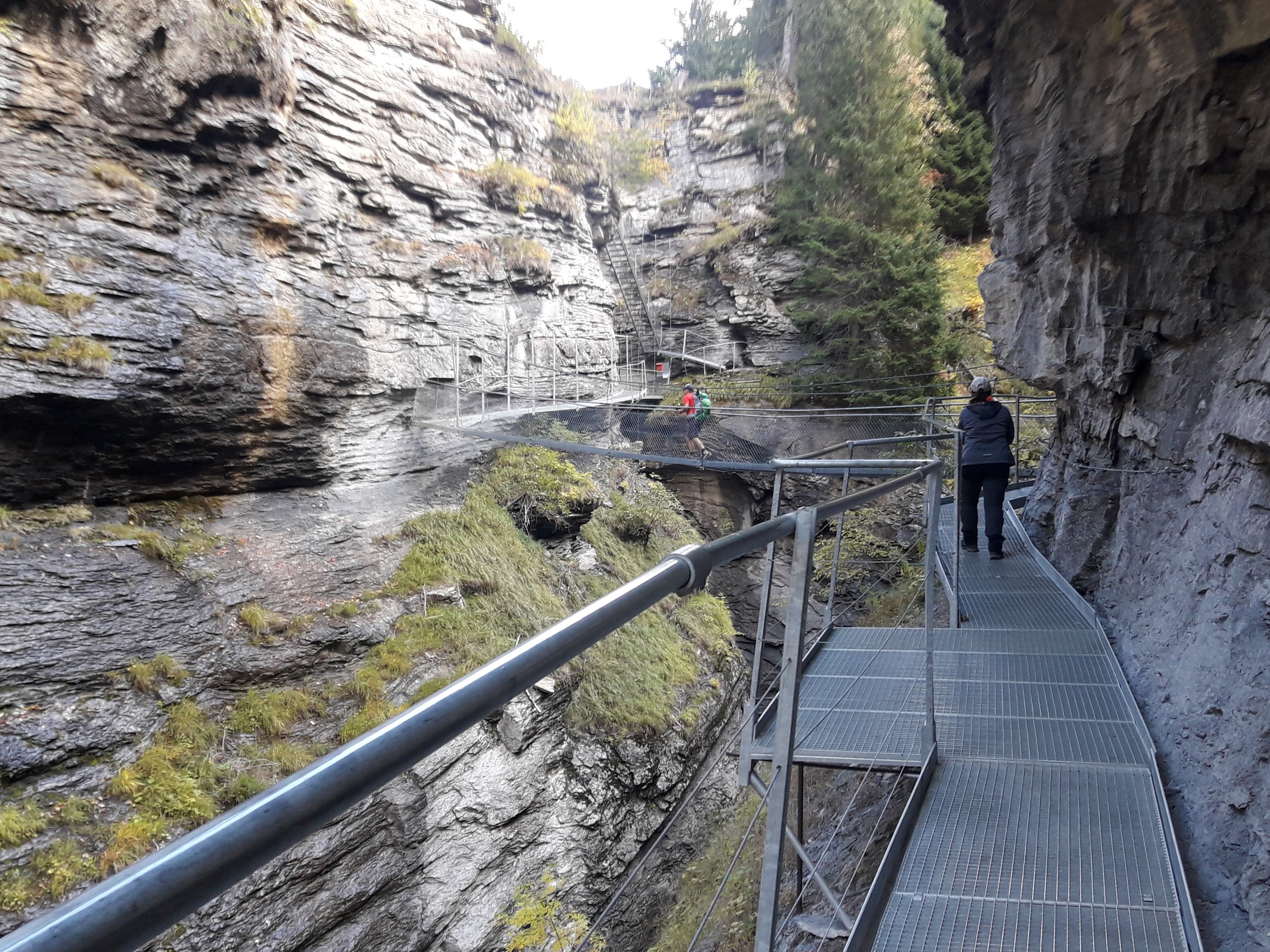 Hikers exploring the canyon in Switzerland