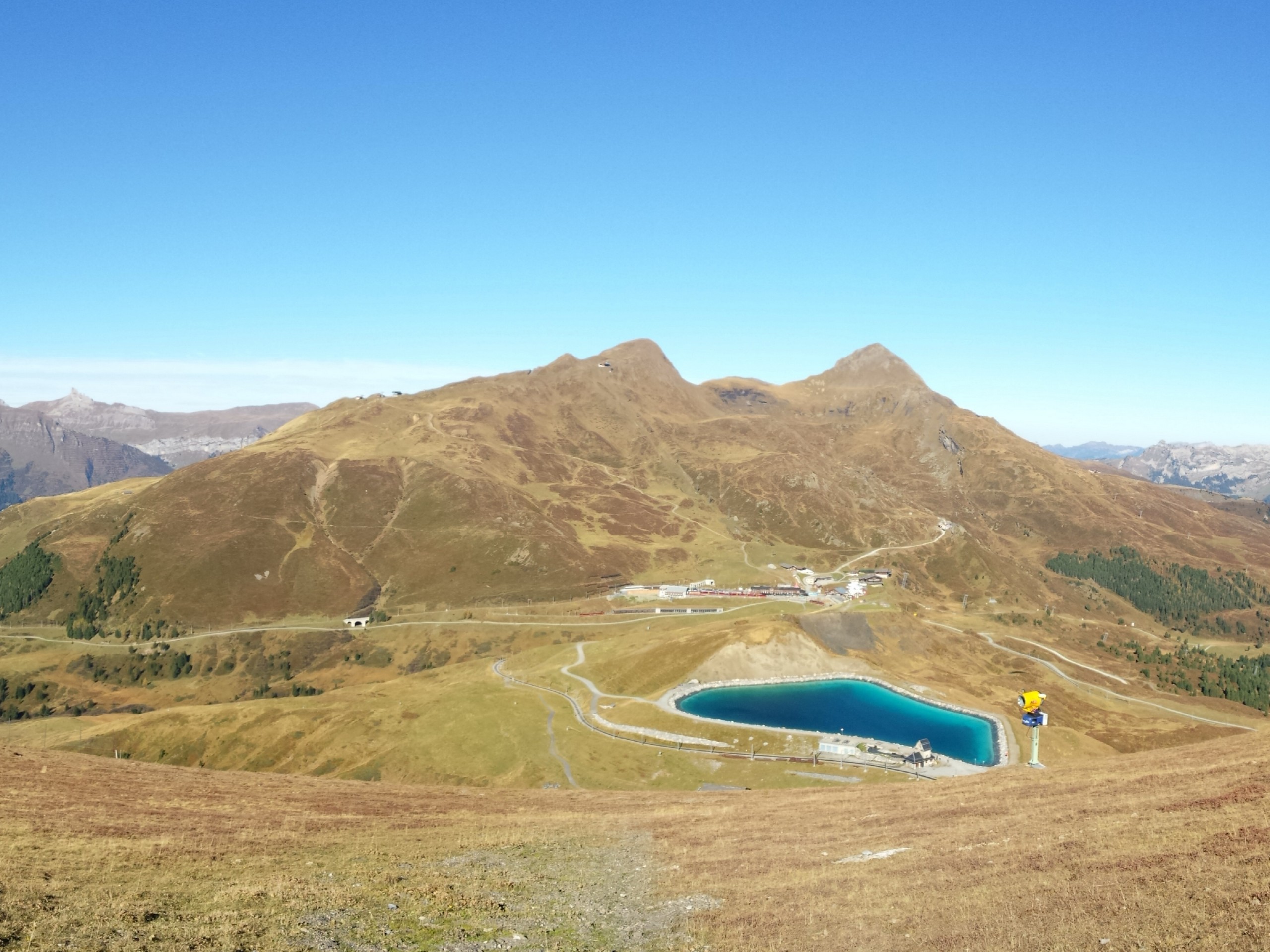 Small blue lake seen from Eiger Lake in Switzerland