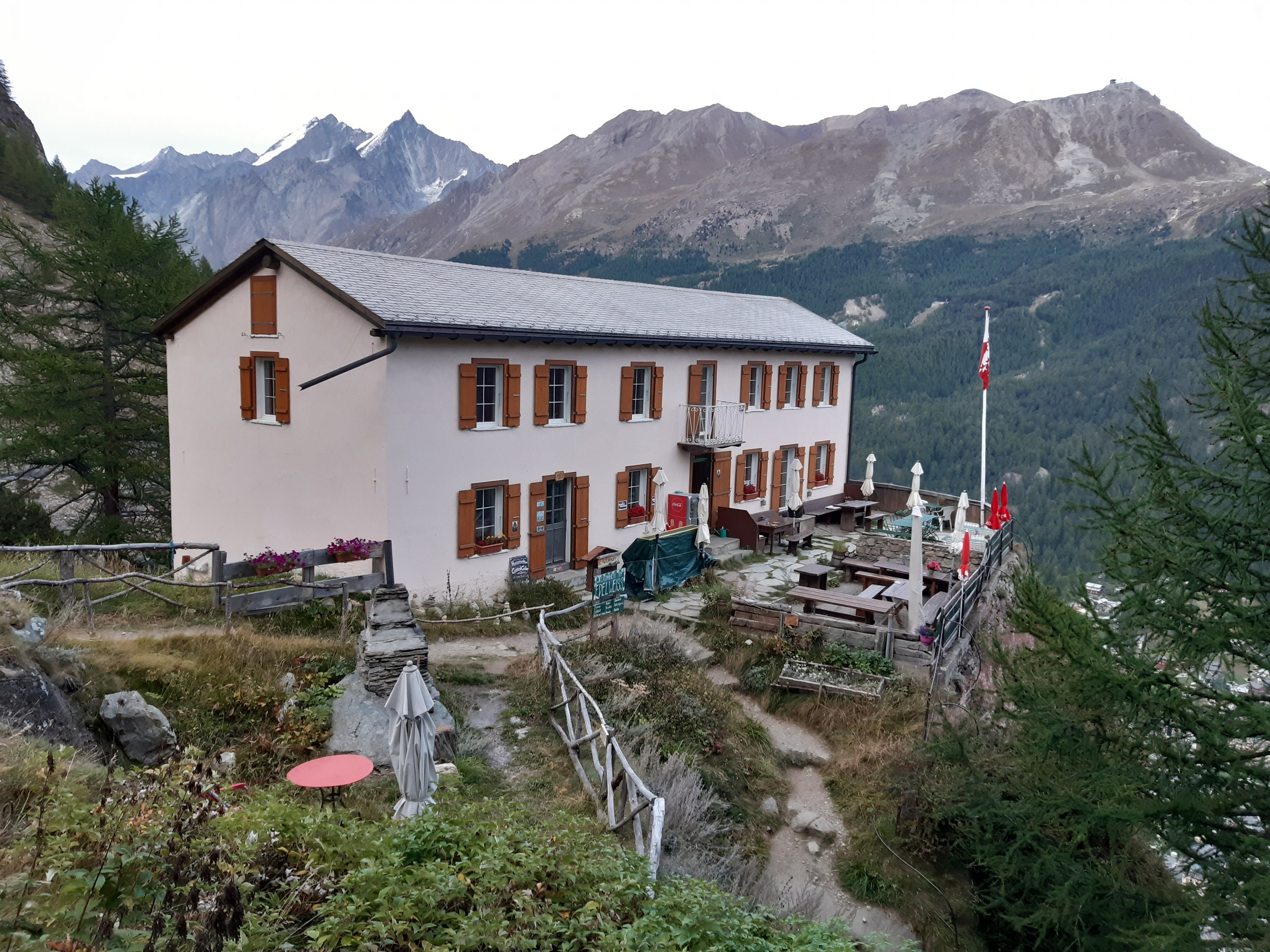 Restaurant on the cliff in Swiss Alps