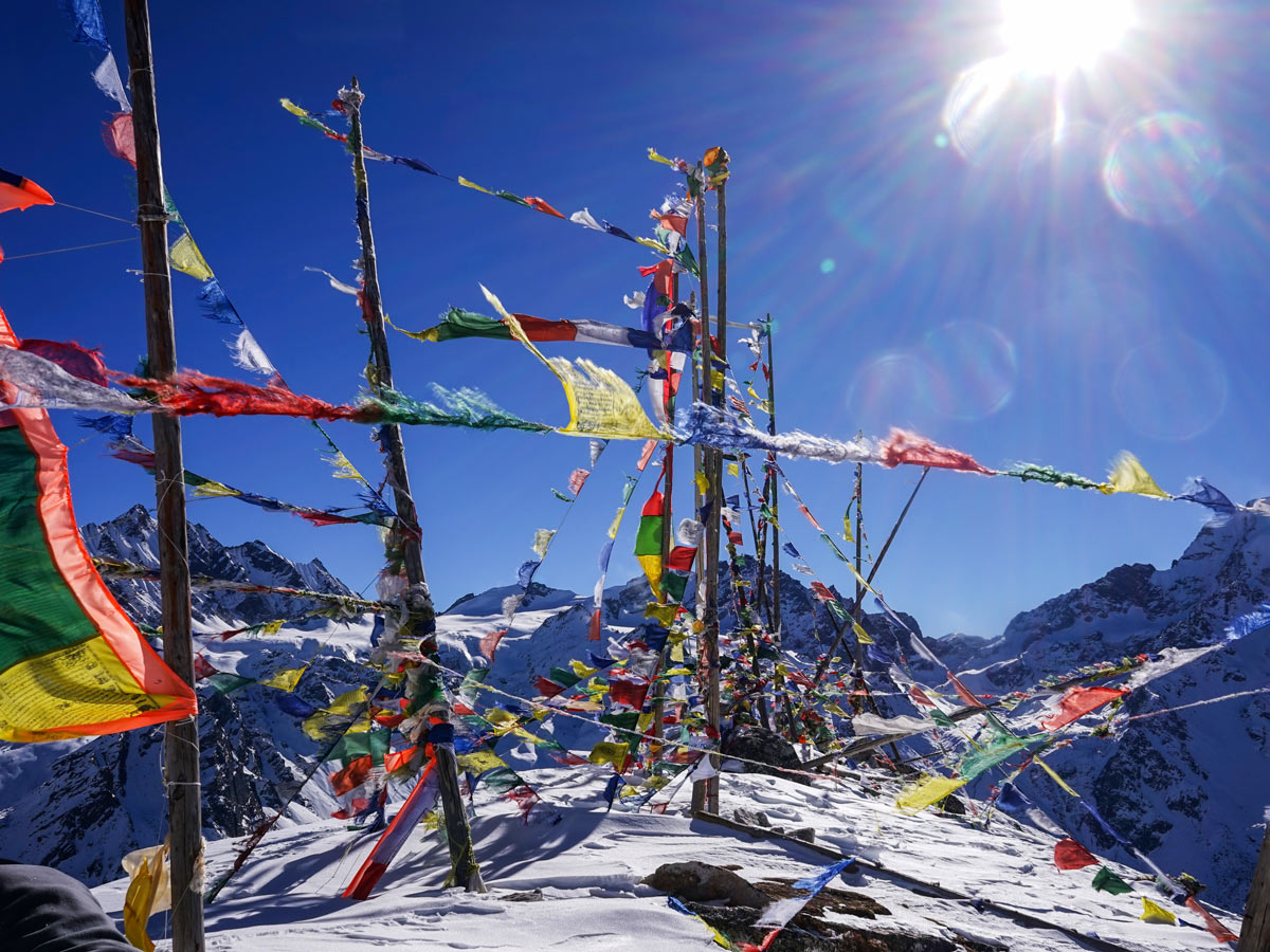 Colourful flags at the summit