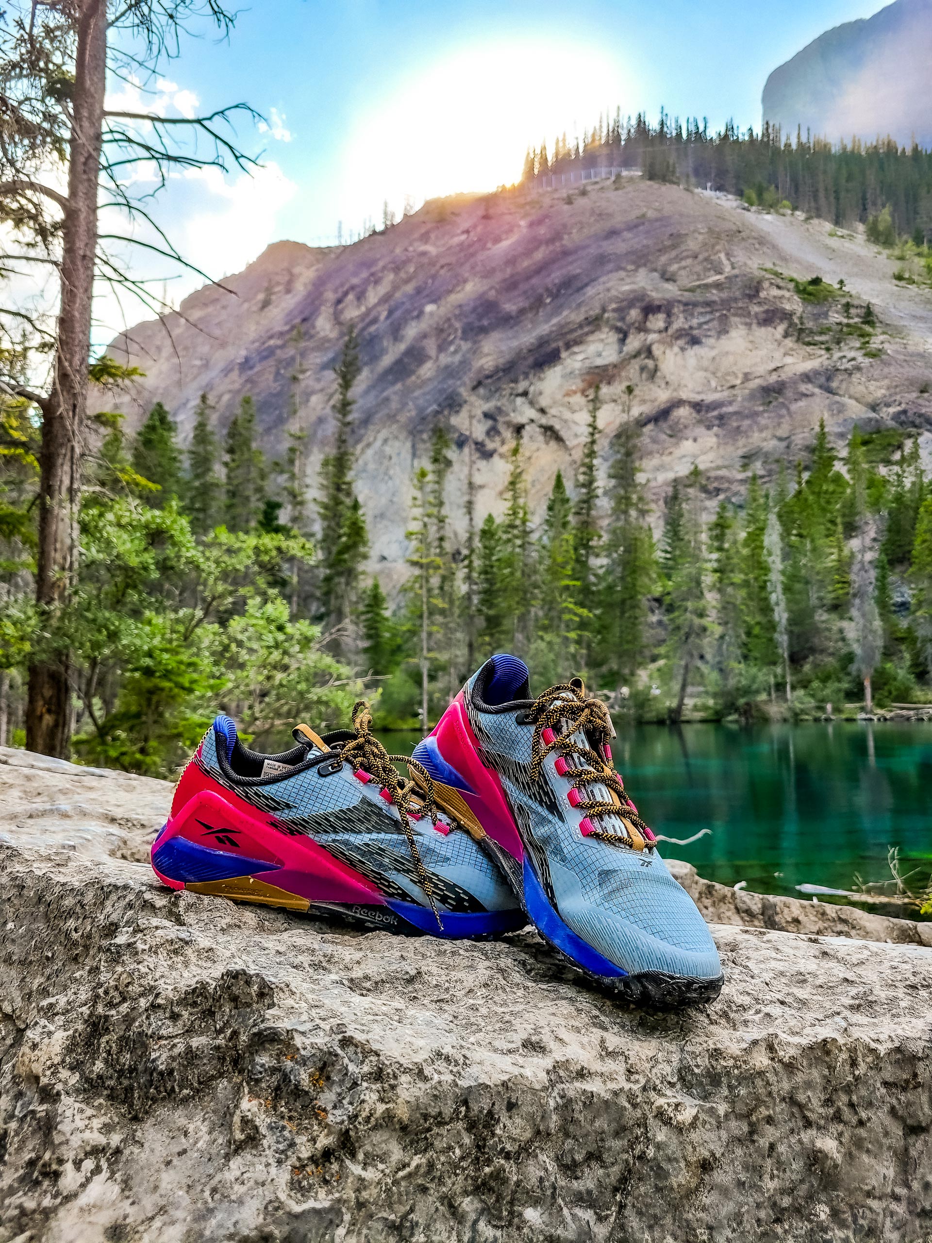 Reebok Nano X1 Adventure trail runner cross training shoe sitting on rocks by Grassi Lakes Canmore Alberta