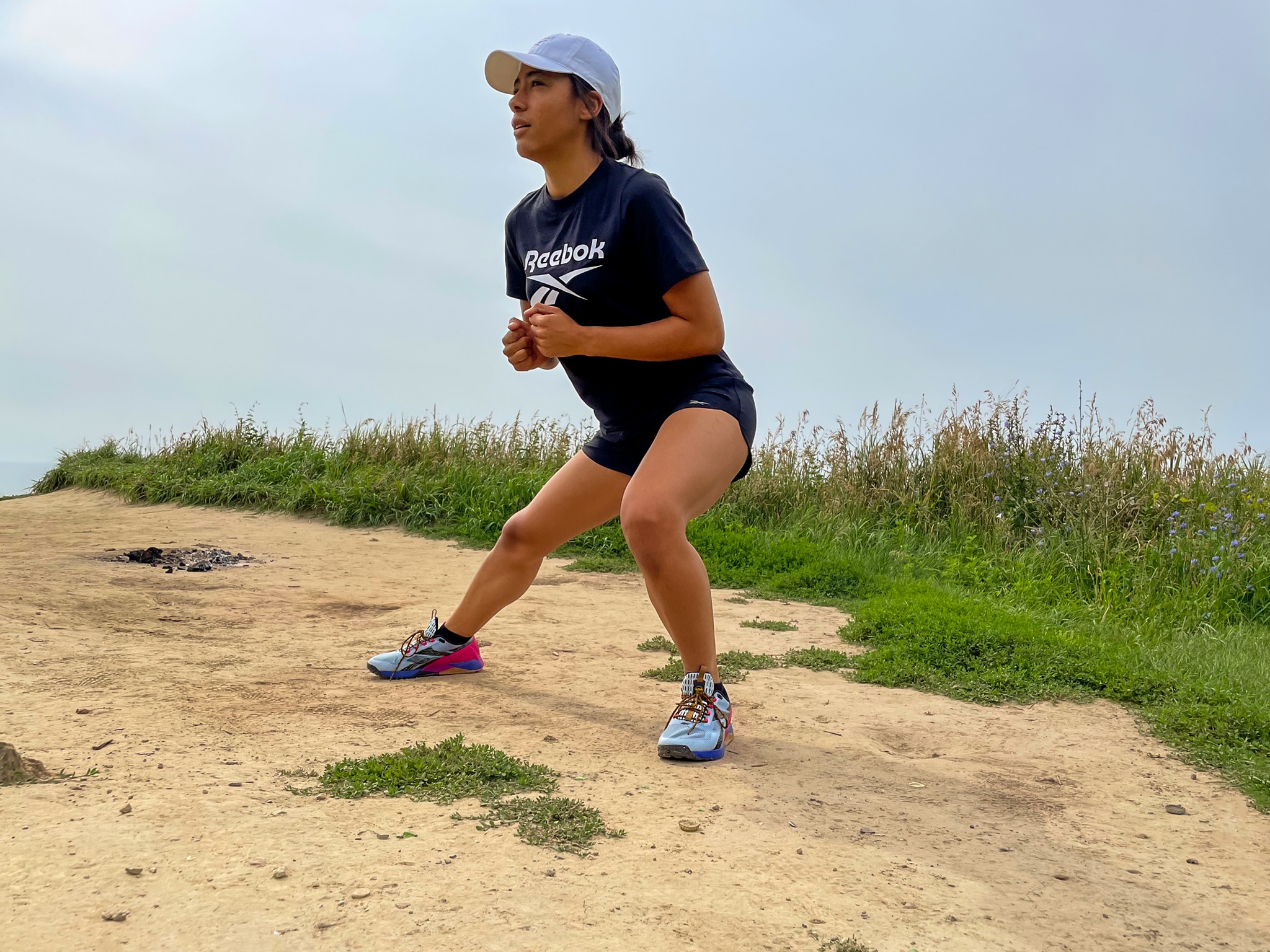 Nadine doing outdoor workout in Reebok Nano X1 Adventure trail runner near Toronto