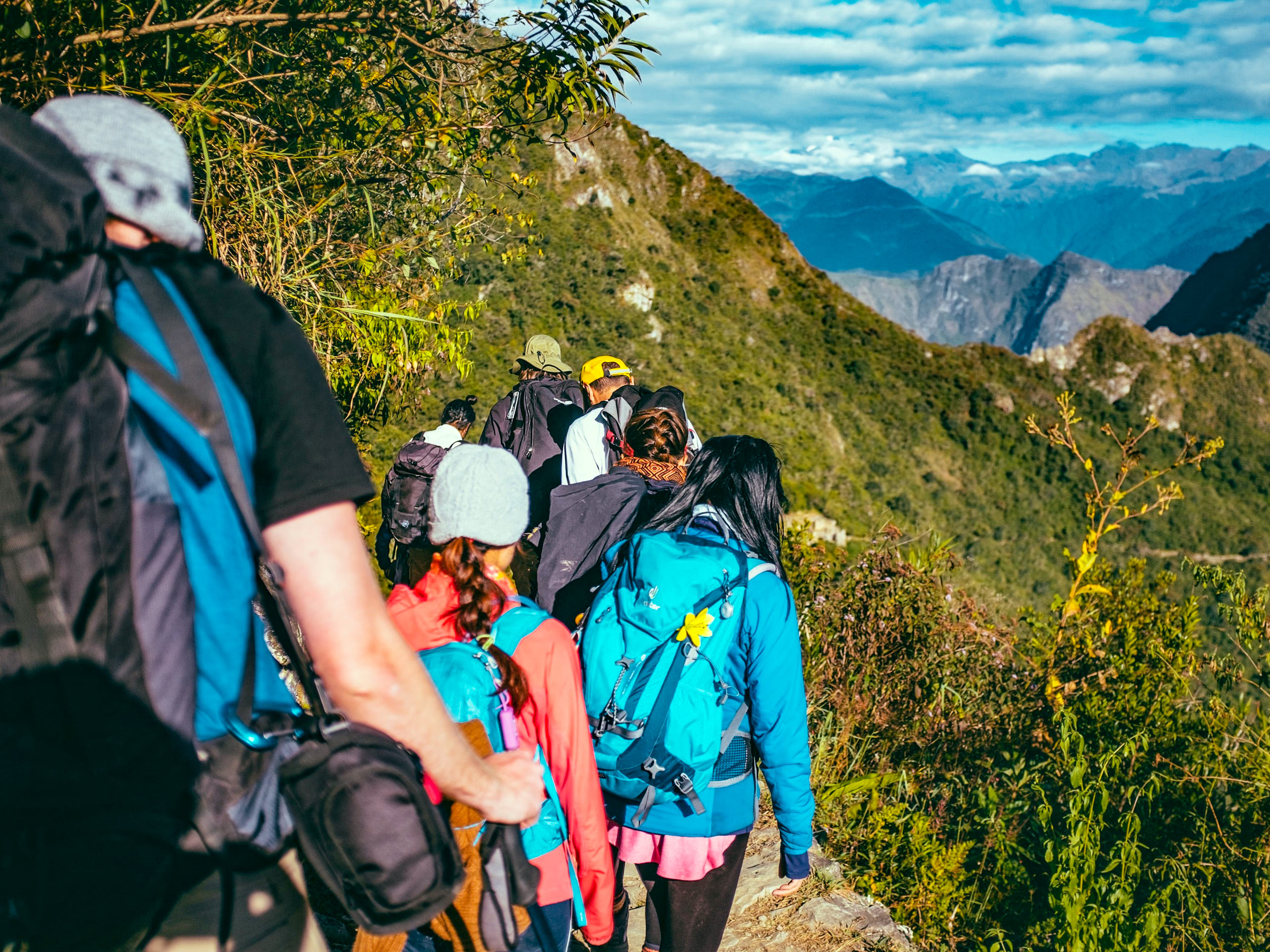 Hiking backpacking trekking team going to Machu Pichhu peru