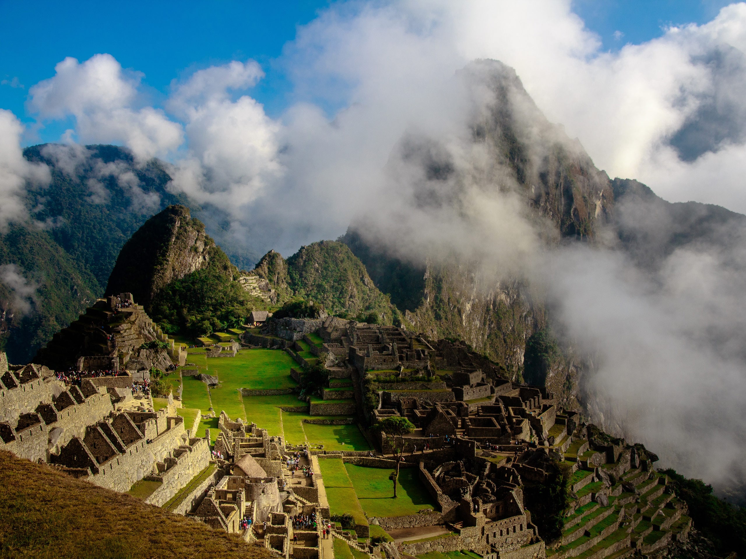 Peru Inca Trail to Machu Picchu low clouds over ancient civilization