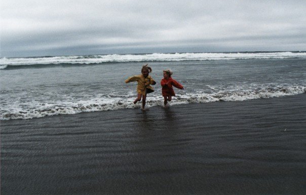 Running in the ocean with my sister and mom (not featured)