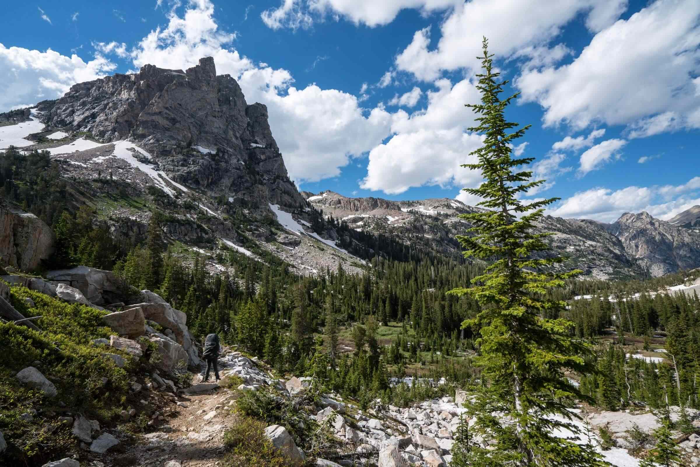 A Hiker walking the Teton Crest Trail