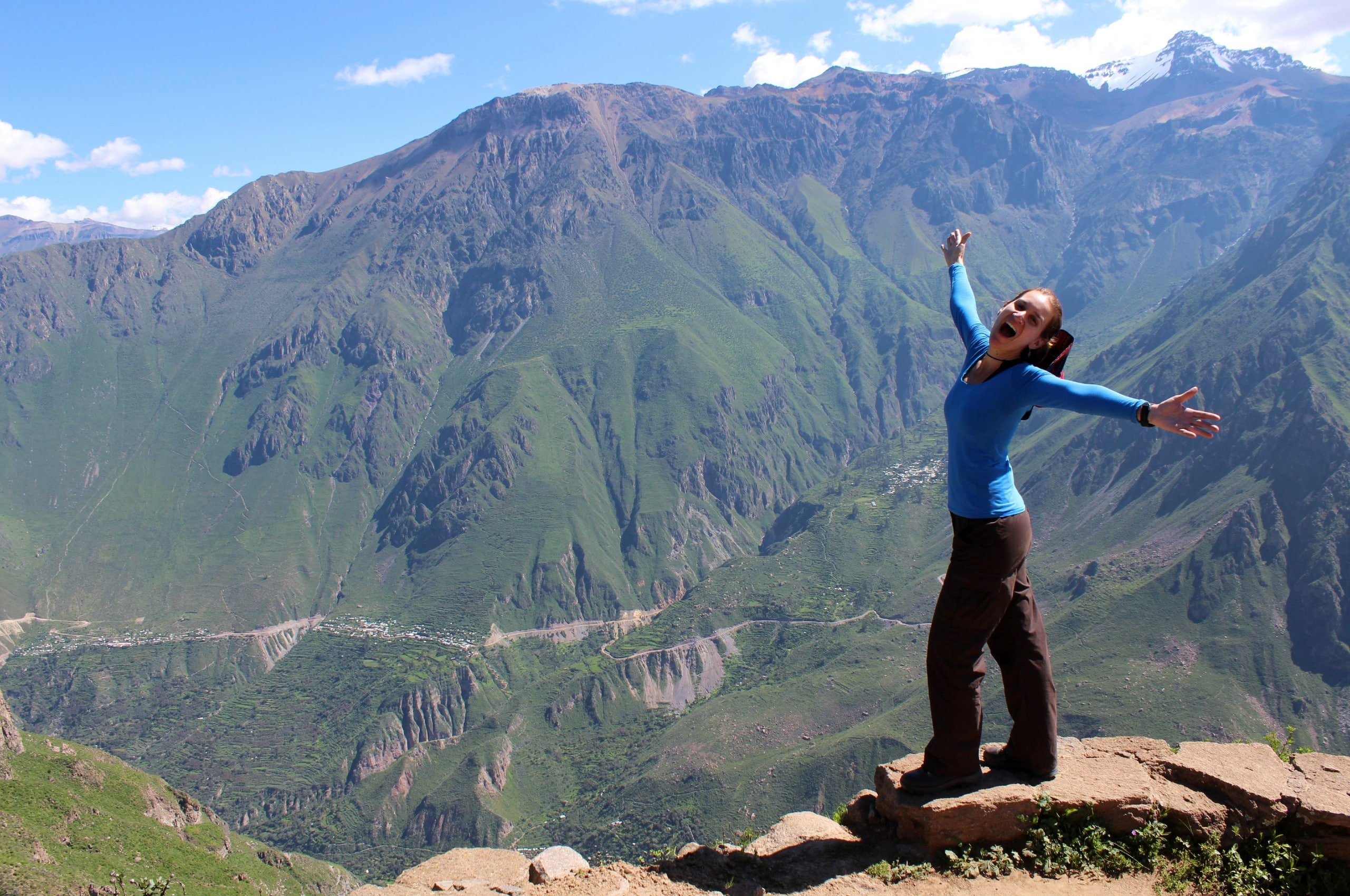 Girl enjoying the views from the mountain top